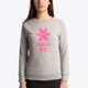 Girl wearing the Osaka kids sweater in grey with pink logo. Front view