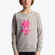 Boy wearing the Osaka kids sweater in grey with pink logo. Front view