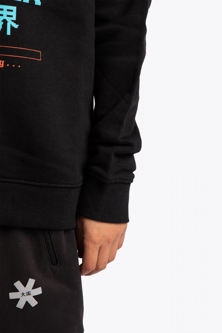 Osaka kids pixo sweater in black with orange and blue logo. Detail view sleeve