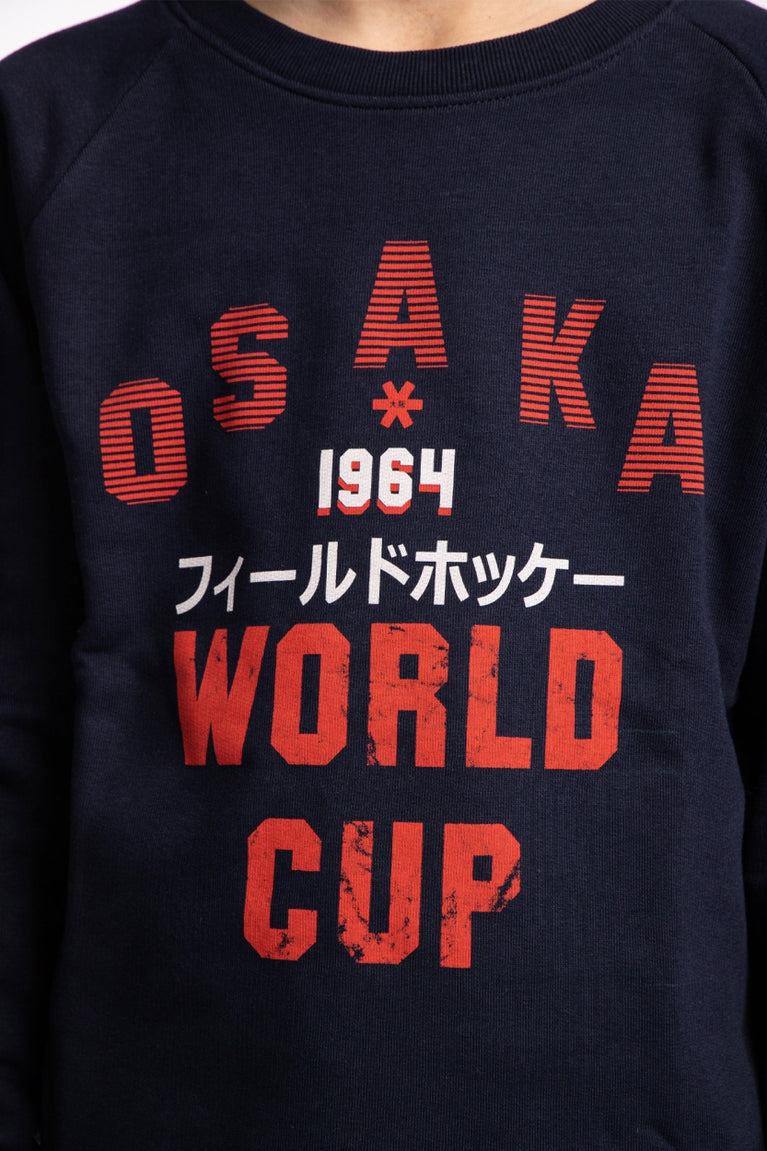 Osaka kids worldcup sweater in navy with orange logo. Detail view logo