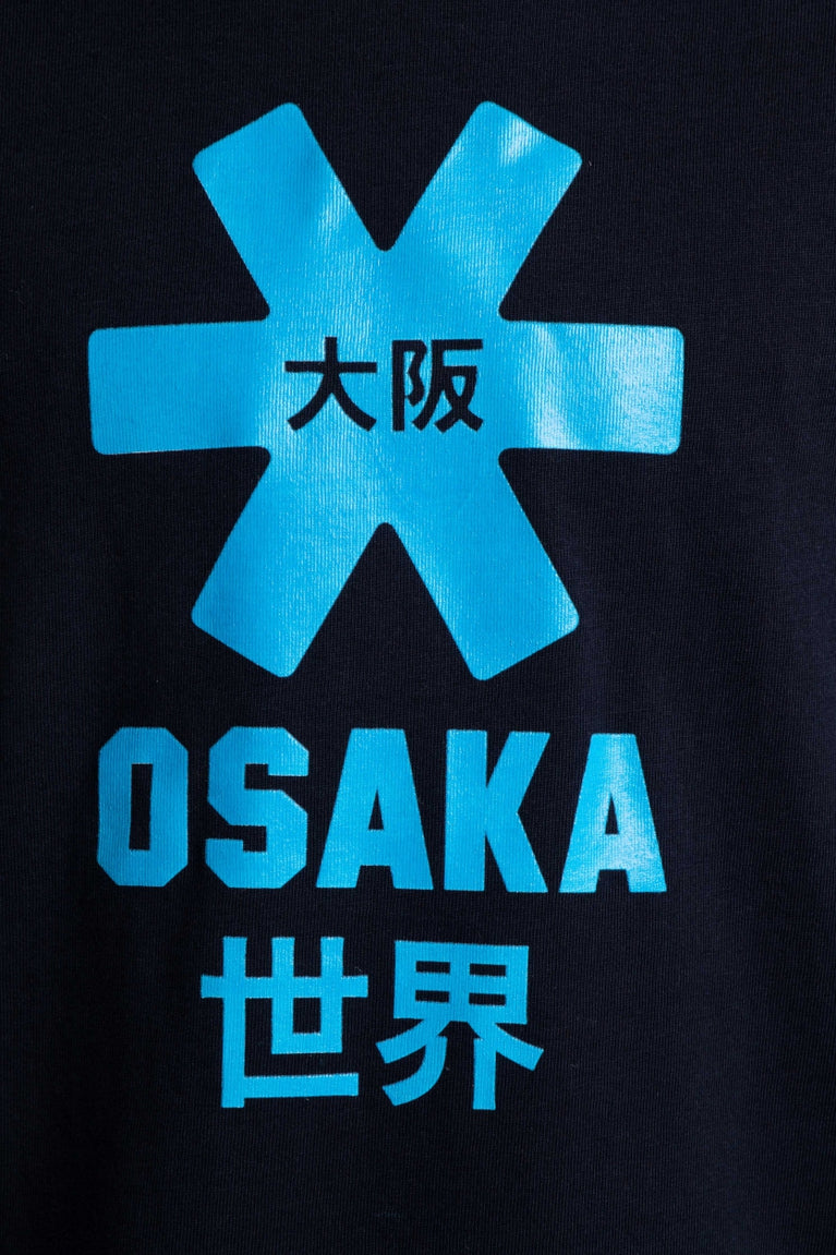 Osaka kids tee short sleeve navy with logo in blue. Detail view logo