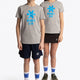 Boy and girl wearing the Osaka kids tee short sleeve grey with logo in blue. Front full view
