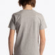 Boy wearing the Osaka kids tee short sleeve grey with logo in blue. Back view