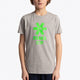 Boy wearing the Osaka kids tee short sleeve grey with logo in green. Front view