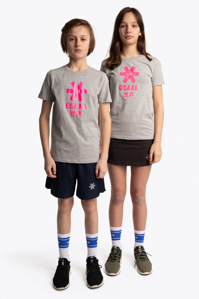 Boy and girl wearing the Osaka kids tee short sleeve grey with logo in pink. Front full view