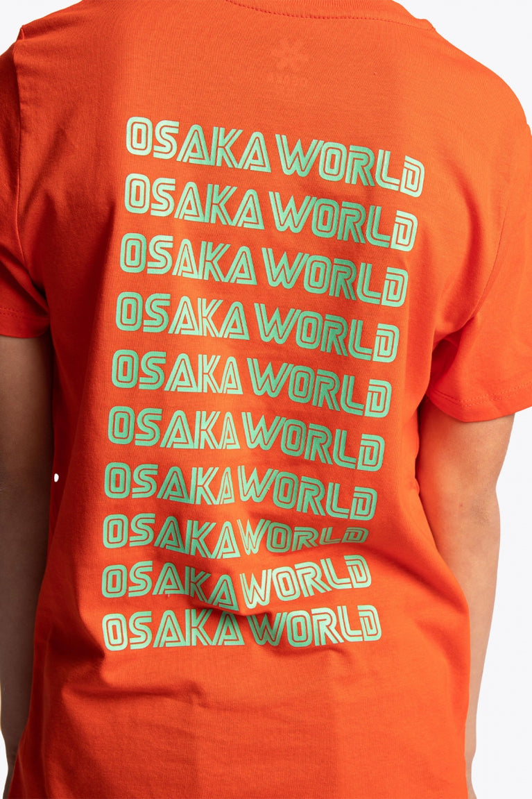 Osaka kids service games tee short sleeve orange with logo in green. Detail view logo back
