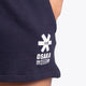 Woman wearing the Osaka women shorts in navy with white logo. Front detail logo view