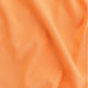 Osaka women ball skort in orange with logo in white. Detail fabric view