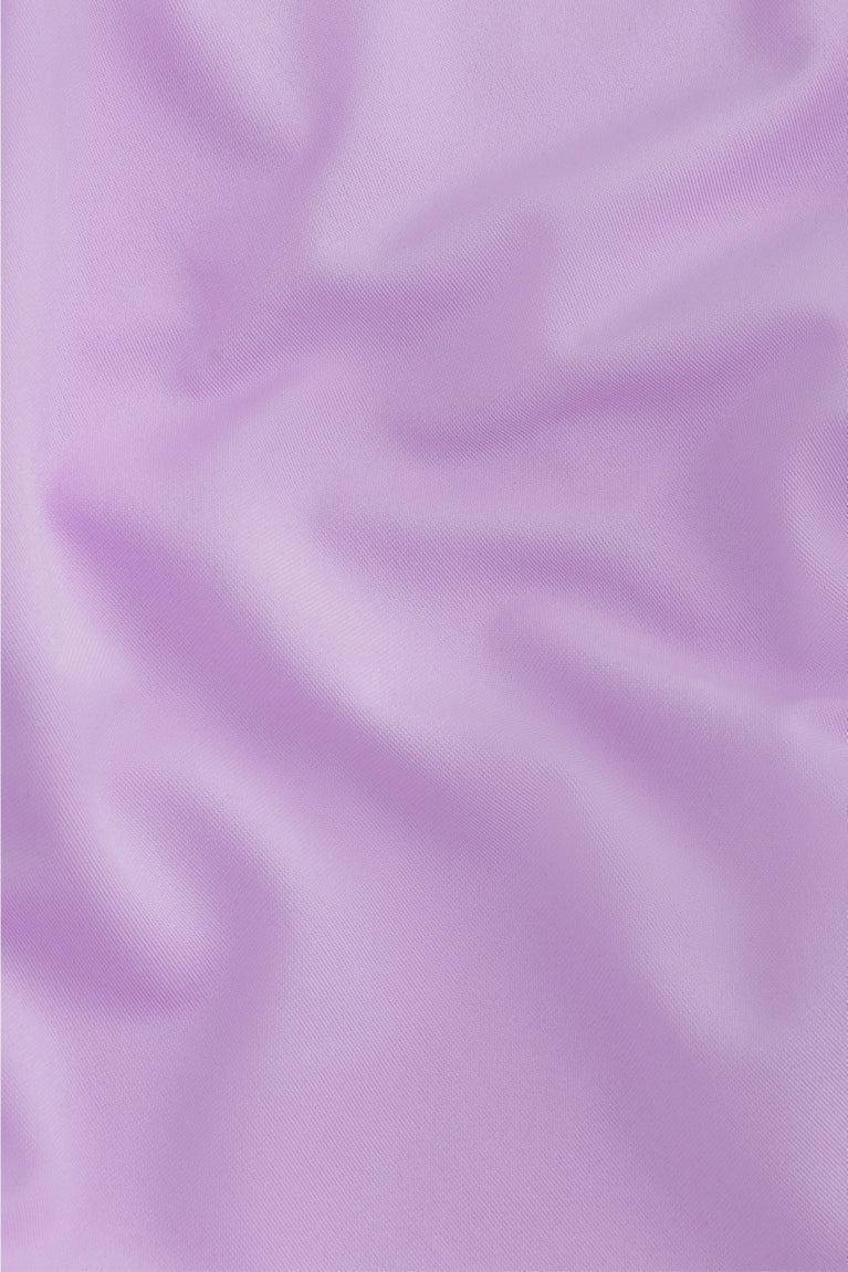 Osaka women ball skort in light purple with logo in grey. Detail fabric view