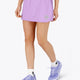 Woman wearing the Osaka women ball skort in light purple with logo in grey. Front view