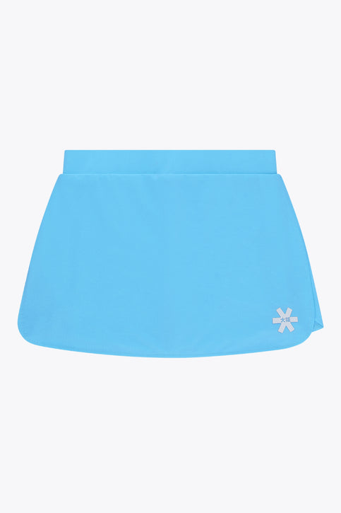 Osaka women ball skort in light blue with logo in grey. Front flatlay view