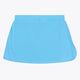 Osaka women ball skort in light blue with logo in grey. Back flatlay view