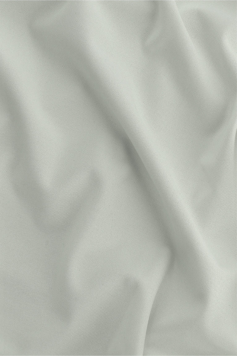 Osaka women ball skort in light grey with logo in grey. Detail fabric view