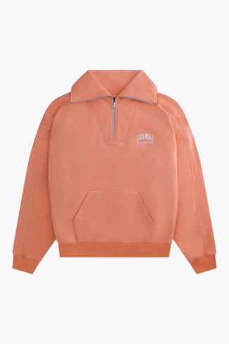 Athletin: Nele Gilis Osaka women half zip sweater in peach with white logo. Front flatlay view
