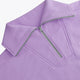 Osaka women half zip sweater in light purple with white logo. Front detail neck view