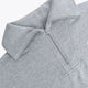 Osaka women half zip sweater in heather grey with white logo. Front detail flatlay neck view