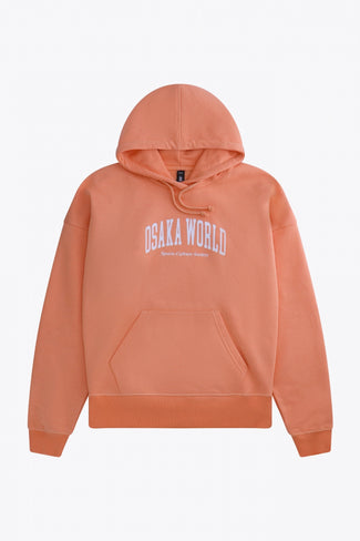 Color Mujer <tc>Hoodie</tc> Osaka women hoodie in peach with white logo. Front flatlay view