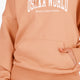 Osaka women hoodie in peach with white logo. Front view