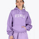 Woman wearing the Osaka women hoodie in light purple with white logo. Front view