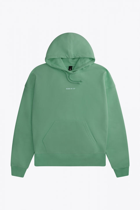 Osaka women hoodie in green with white logo. Front flatlay view