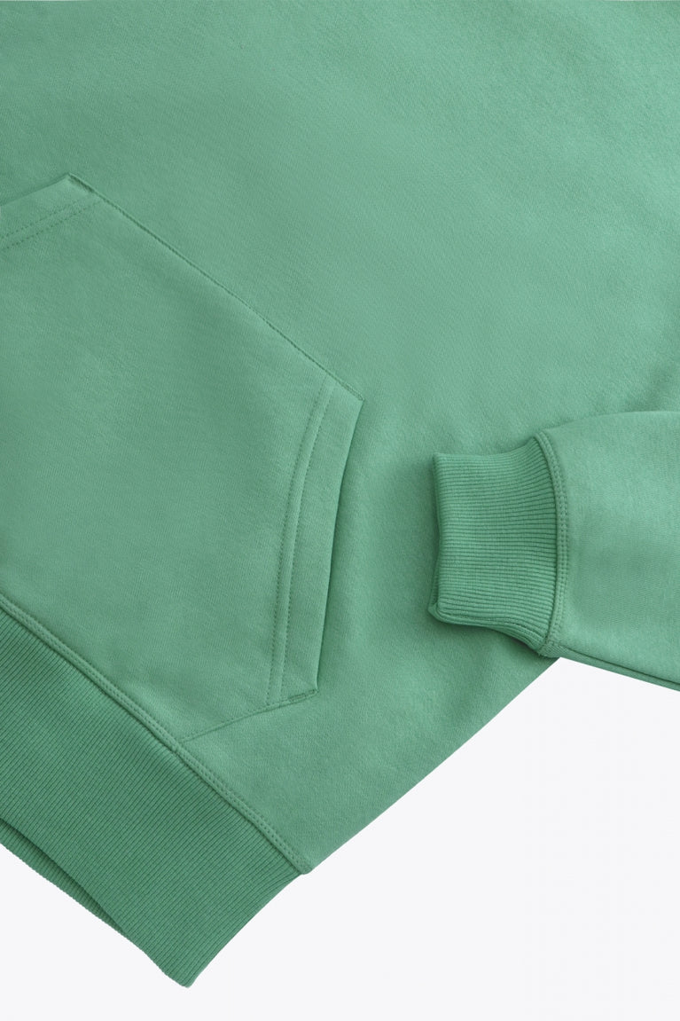 Osaka women hoodie in green with white logo. Detail sleeve flatlay view