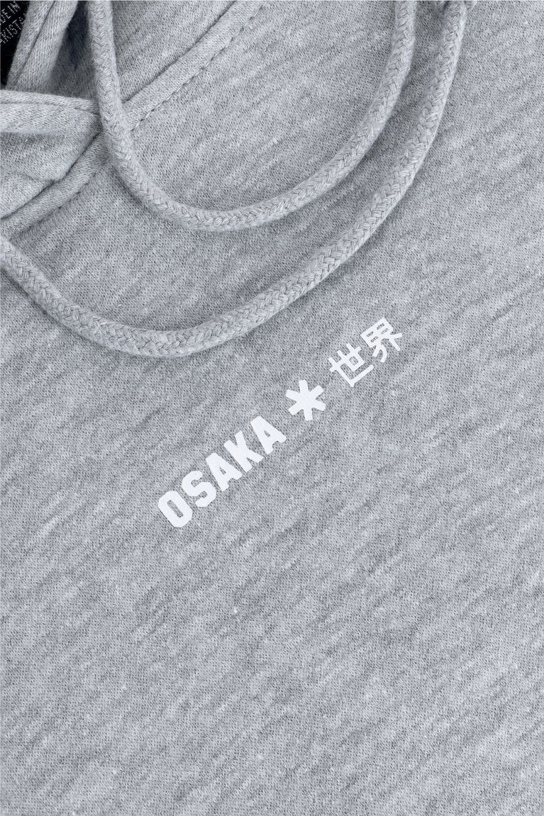 Osaka women hoodie in heather grey with white logo. Front detail logo view