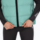 Woman wearing the Osaka women padded gilet in green with grey logo. Front detail view