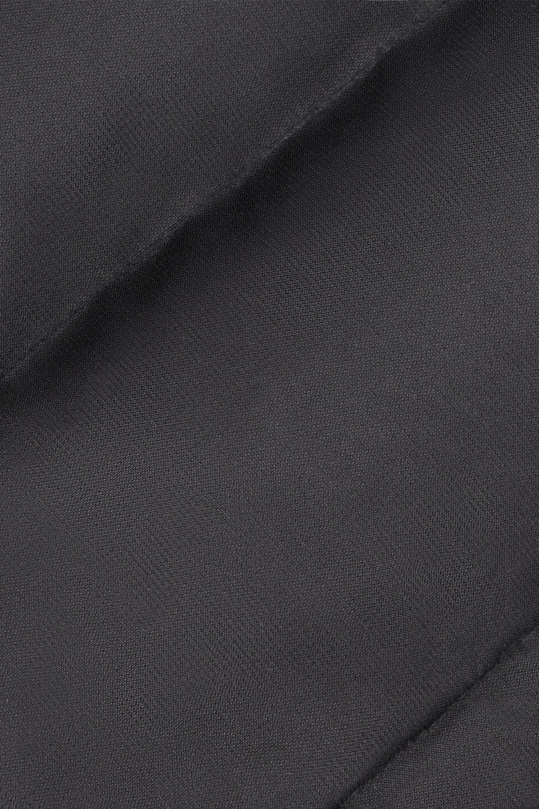 Osaka women padded gilet in black with white logo. Detail fabric view