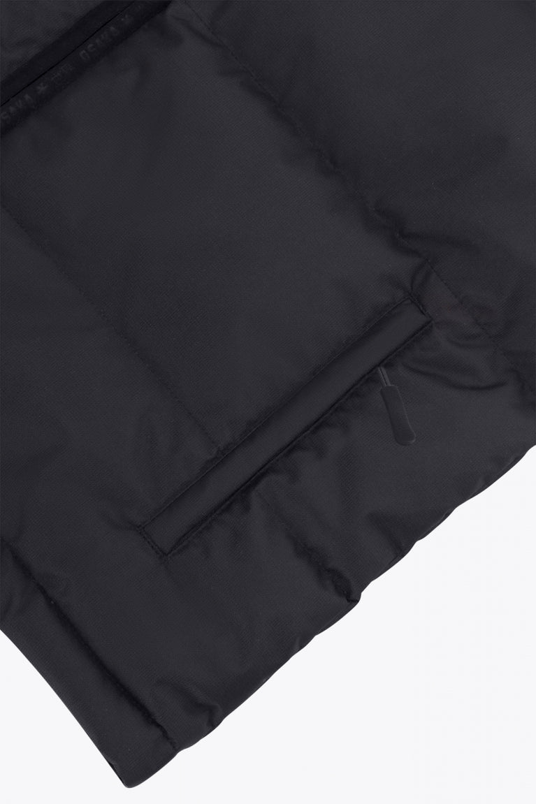 Osaka women padded gilet in black with white logo. Front flatlay detail pocket view
