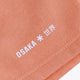 Osaka women shorts in peach with logo in white. Front flatlay detail logo view