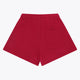 Osaka women shorts in red with logo in white. Back flatlay view