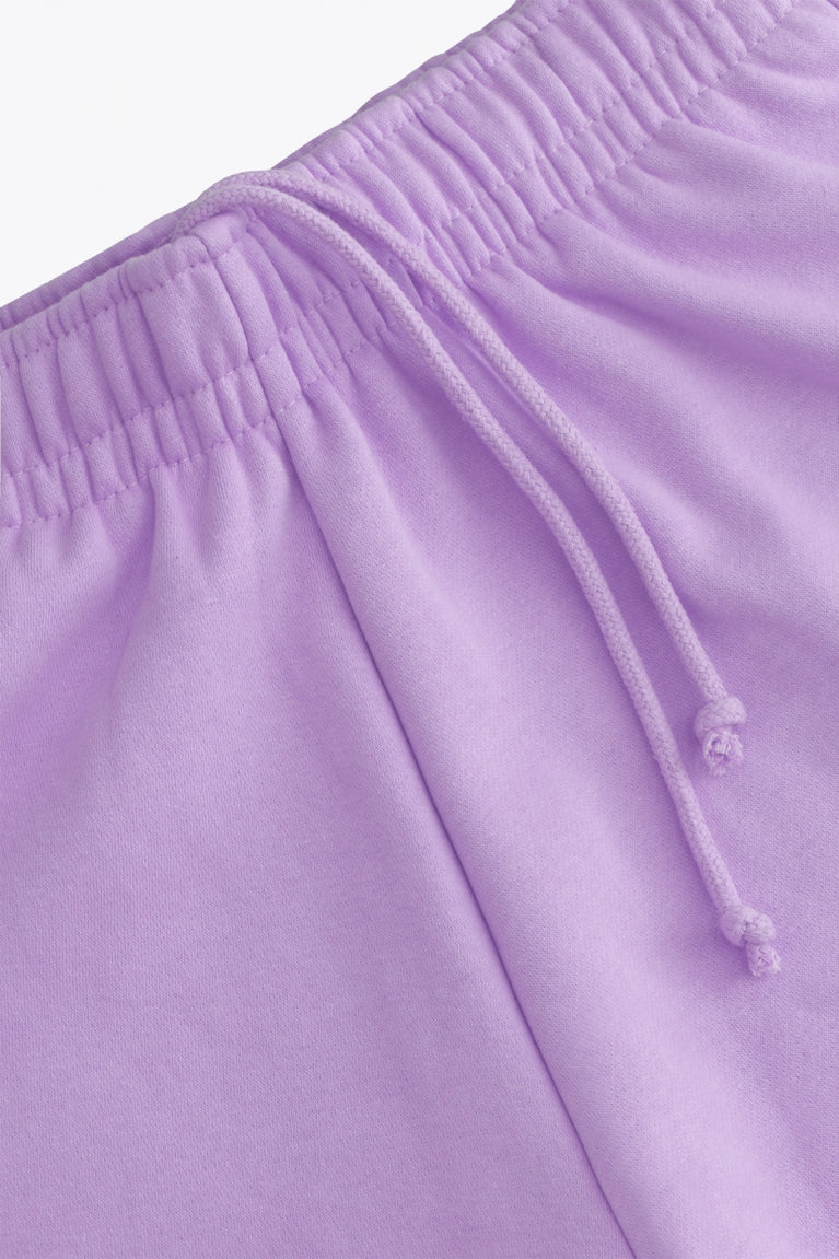Osaka women shorts in light purple with logo in white. Front detail cords view