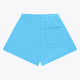 Osaka women shorts in light blue with logo in white. Back flatlay view