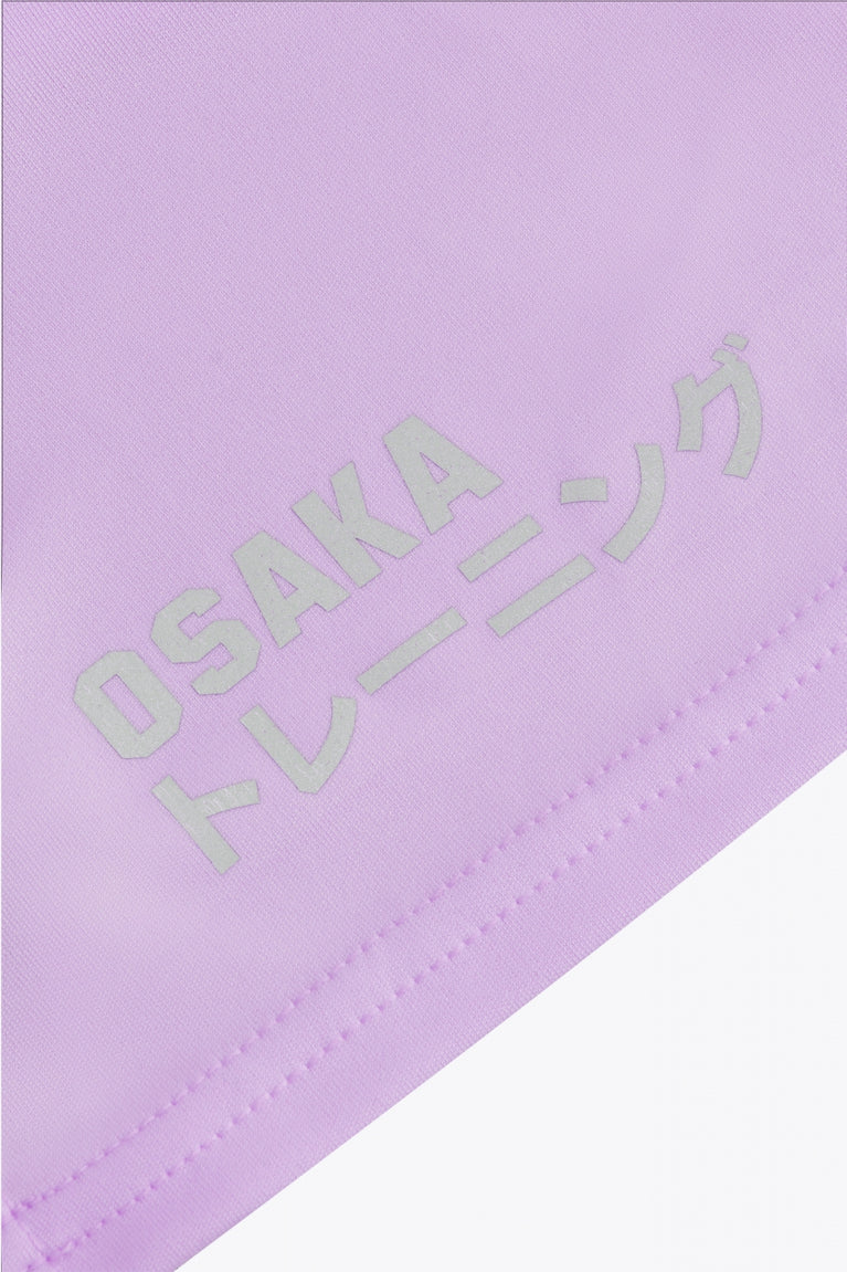 Osaka women singlet in light purple with logo in grey. Detail back logo view