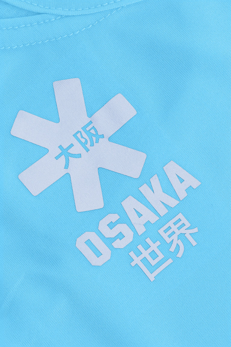 Osaka women singlet in light blue with logo in grey. Detail logo view