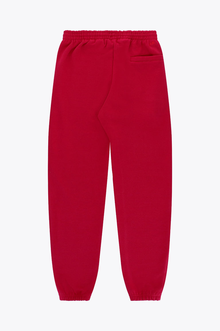 Osaka women sweatpants in red with logo in white. Back flatlay view
