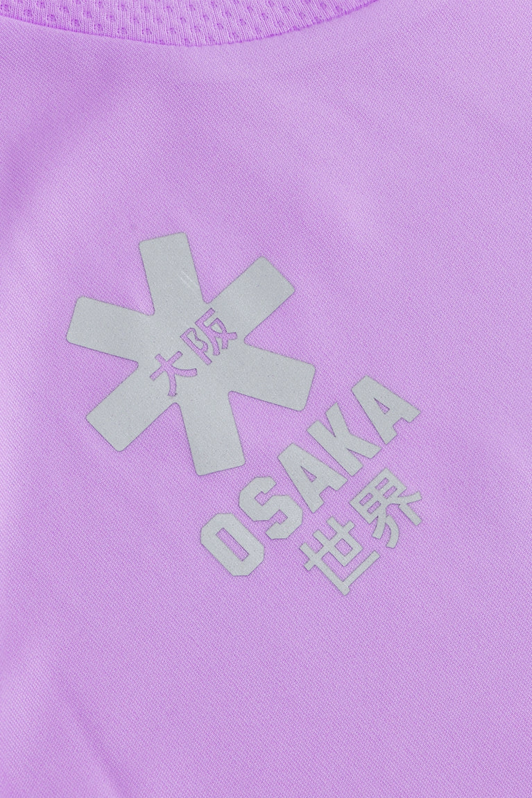 Osaka women tee short sleeve in light purple with logo in grey. Detail logo view