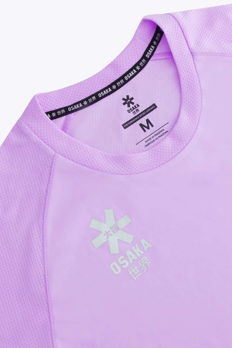 Osaka women tee short sleeve in light purple with logo in grey. Front flatlay detail view