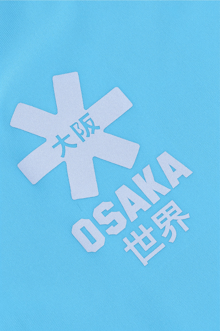 Osaka women tee short sleeve in light blue with logo in grey. Front flatlay detail logo view