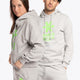 Woman and man wearing the Osaka basic unisex hoodie in grey with green logo on it. Front view