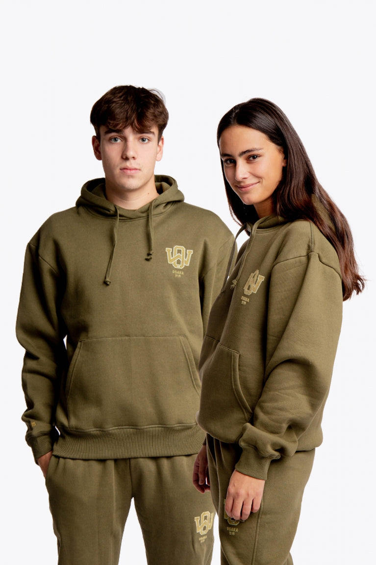 Boy and girl wearing the Osaka unisex hoodie in army green with college initials in yellow. Front view