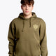 Boy wearing the Osaka unisex hoodie in army green with college initials in yellow. Front view