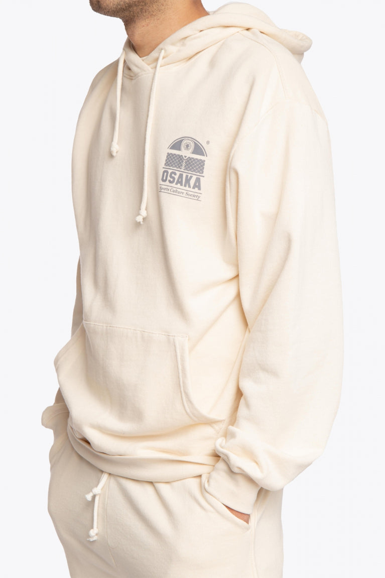 the Osaka unisex cream hoodie sports culture society with logo in dark grey. Front detail view