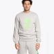 Man wearing the Osaka grey unisex sweater with green logo. Front view