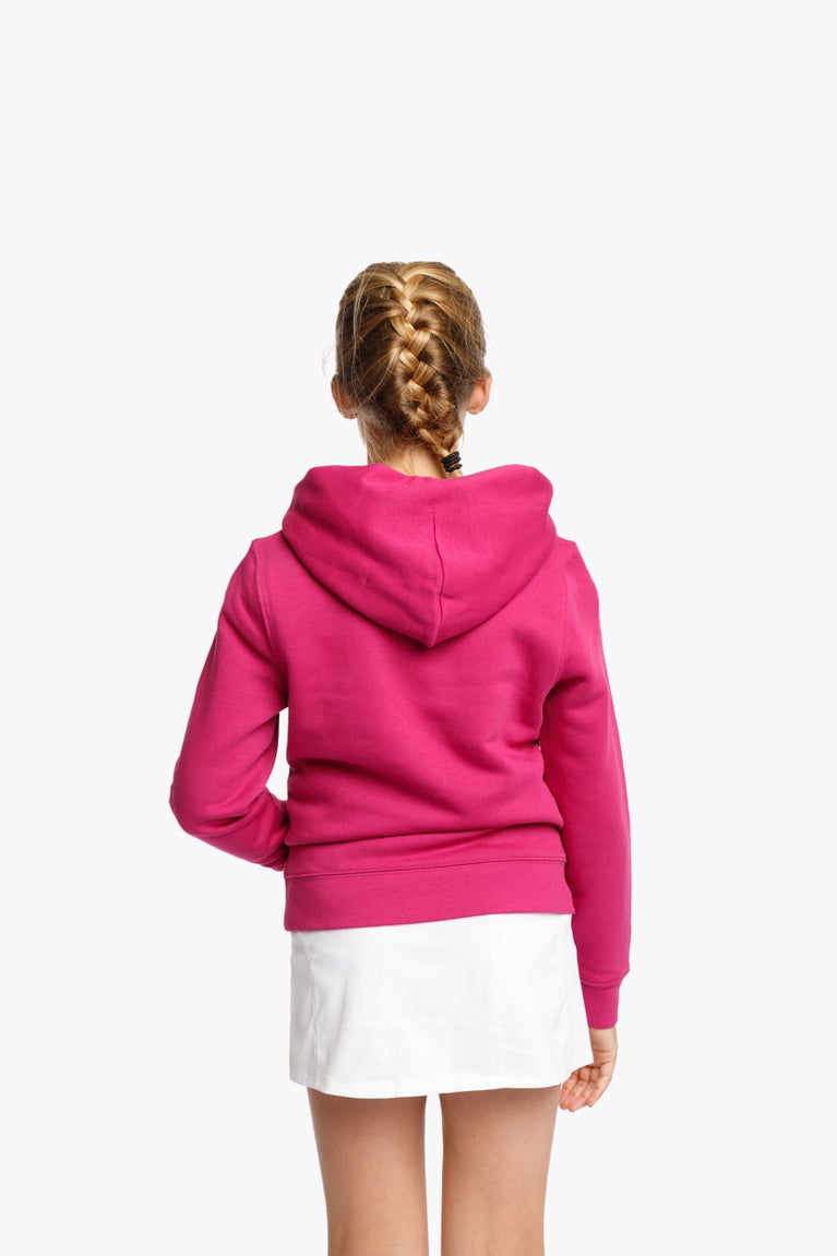  Girl wearing the Osaka kids hoodie in pink and off-set star logo in white and blue. Back view