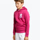 Boy wearing the Osaka kids hoodie in pink and off-set star logo in white and blue. Front/side view