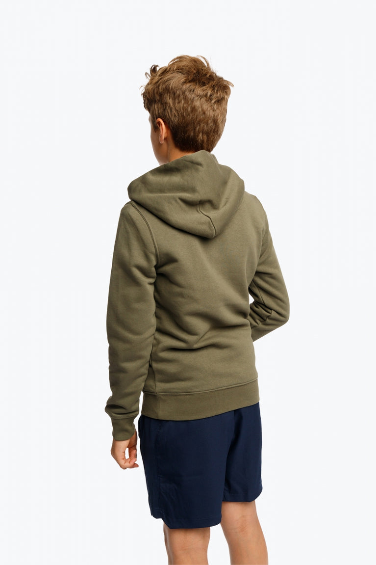 Boy wearing the Osaka kids hoodie in khaki with yellow logo. Back view