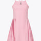 Osaka women pleated tech dress in pink with grey logo. Front flatlay view