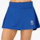 Woman wearing the Osaka women floucy skort princess blue with logo in grey. Front view