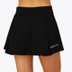 Woman wearing the Osaka women floucy skort black with logo in grey. Back detail view